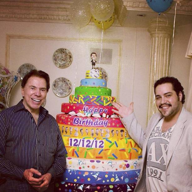O apresentador e Tiago Abravanel durante comemora&ccedil;&atilde;o de seu anivers&aacute;rio em 2012