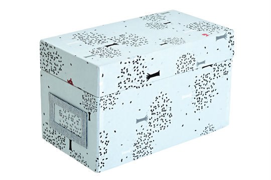 Caixa de tecido para guardar CDs, R$ 80,00. La Spina, Rua Aspicuelta, 35, Vila Madalena, tel.: 3815-5277, www.laspina. com.br.