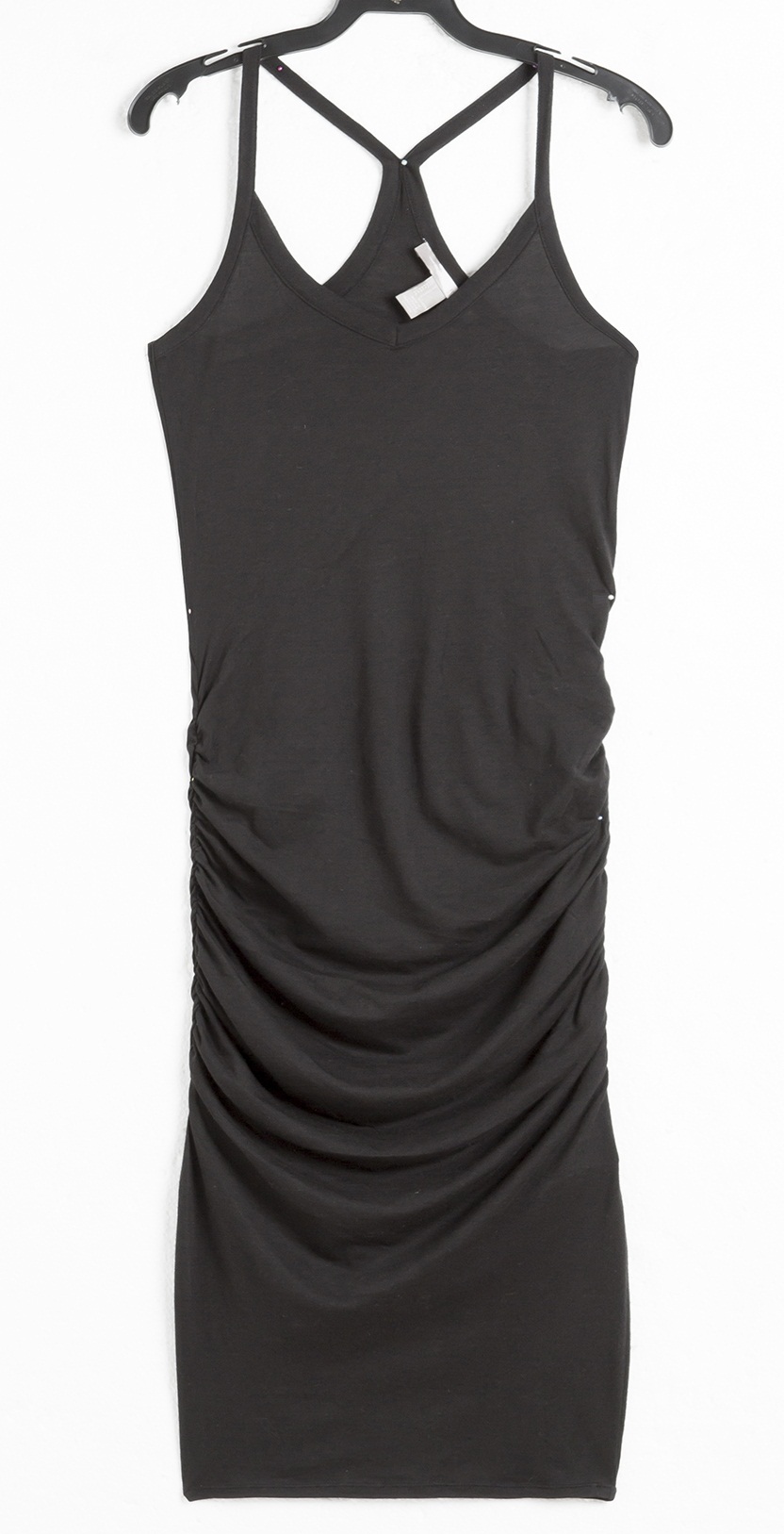 	Vestido justo de al&ccedil;a. R$ 50,90.