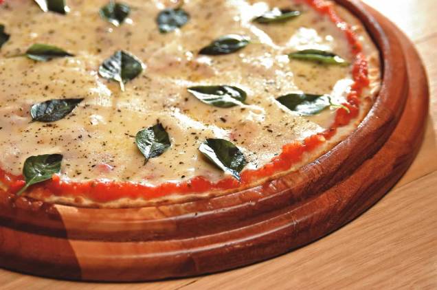 Uma das coberturas mais pedidas da pizzaria Camelo: a clássica margherita Uma das coberturas mais pedidas da pizzaria Camelo: a clássica margherita