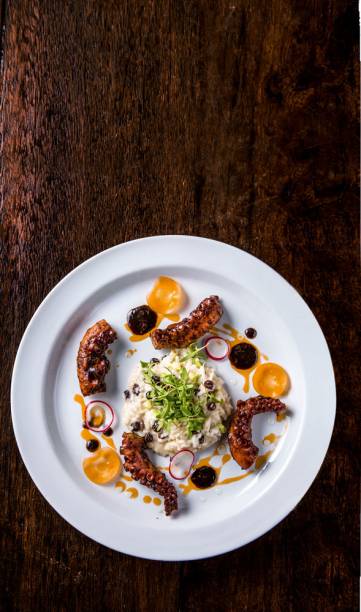 O polvo com risoto de brie O polvo com risoto de brie