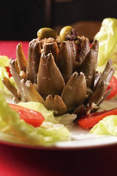 Versão recheada: com pão, aliche, azeitona, alcaparra e parmesão Versão recheada: com pão, aliche, azeitona, alcaparra e parmesão