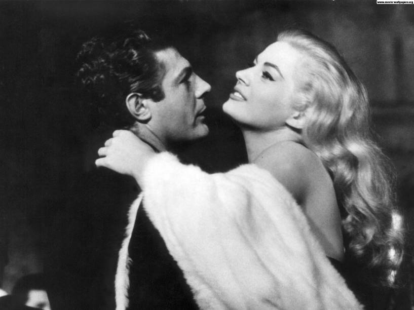 A Doce Vida: Marcello Mastroianni e Anita Ekberg em cena no clássico de Fellini A Doce Vida: Marcello Mastroianni e Anita Ekberg em cena no clássico de Fellini