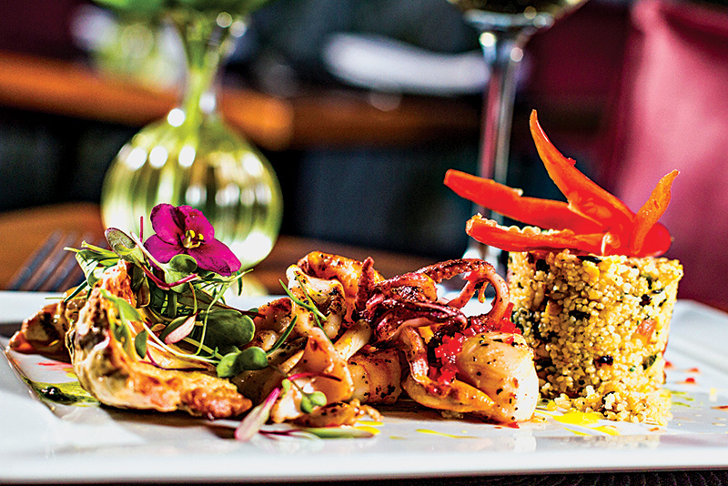 O prato exotique: com vieira, lula, camarão e ostra O prato exotique: com vieira, lula, camarão e ostra