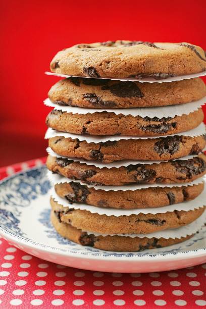 Os cookies são feitos com gotas de chocolate belga Os cookies são feitos com gotas de chocolate belga