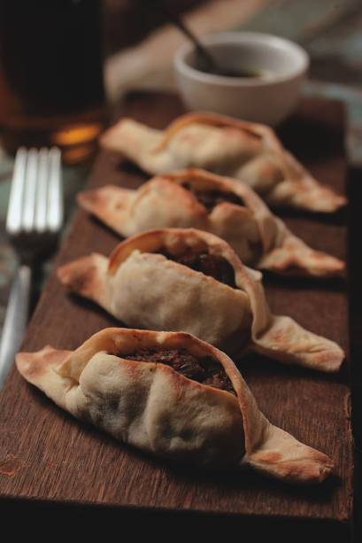 Os pasteizinhos assados de carne Os pasteizinhos assados de carne