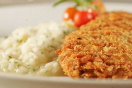 Filé mignon à milanesa com risoto de limão siciliano, do restaurante Nou Filé mignon à milanesa com risoto de limão siciliano, do restaurante Nou