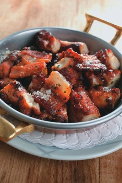 Frigideira de polvo: compõe o menu do português Trindade Frigideira de polvo: compõe o menu do português Trindade