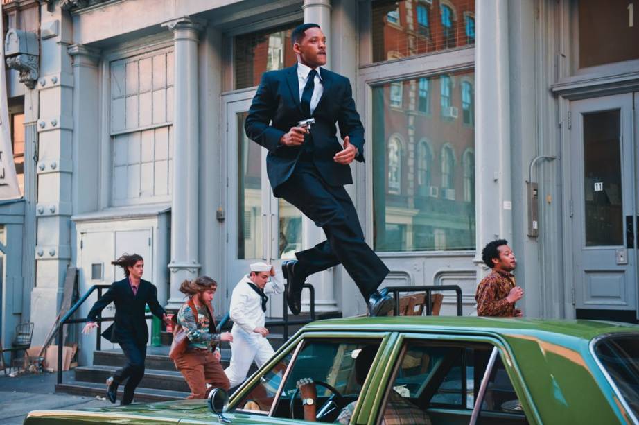 Will Smith como o Agente J: o personagem retorna a 1969 na comédia de ficção científica Homens de Preto 3 Will Smith como o Agente J: o personagem retorna a 1969 na comédia de ficção científica Homens de Preto 3