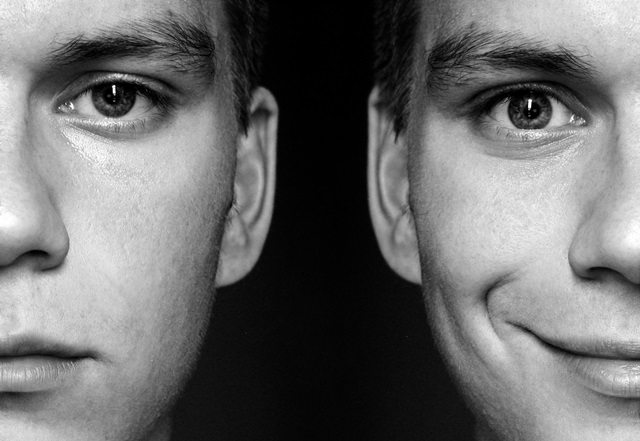 Two faces – smiling and serious