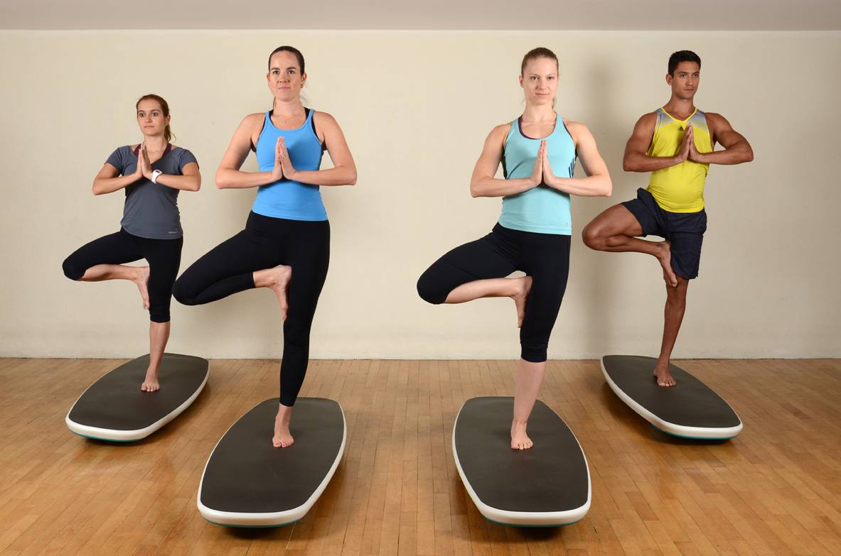 Yoga na prancha de surf