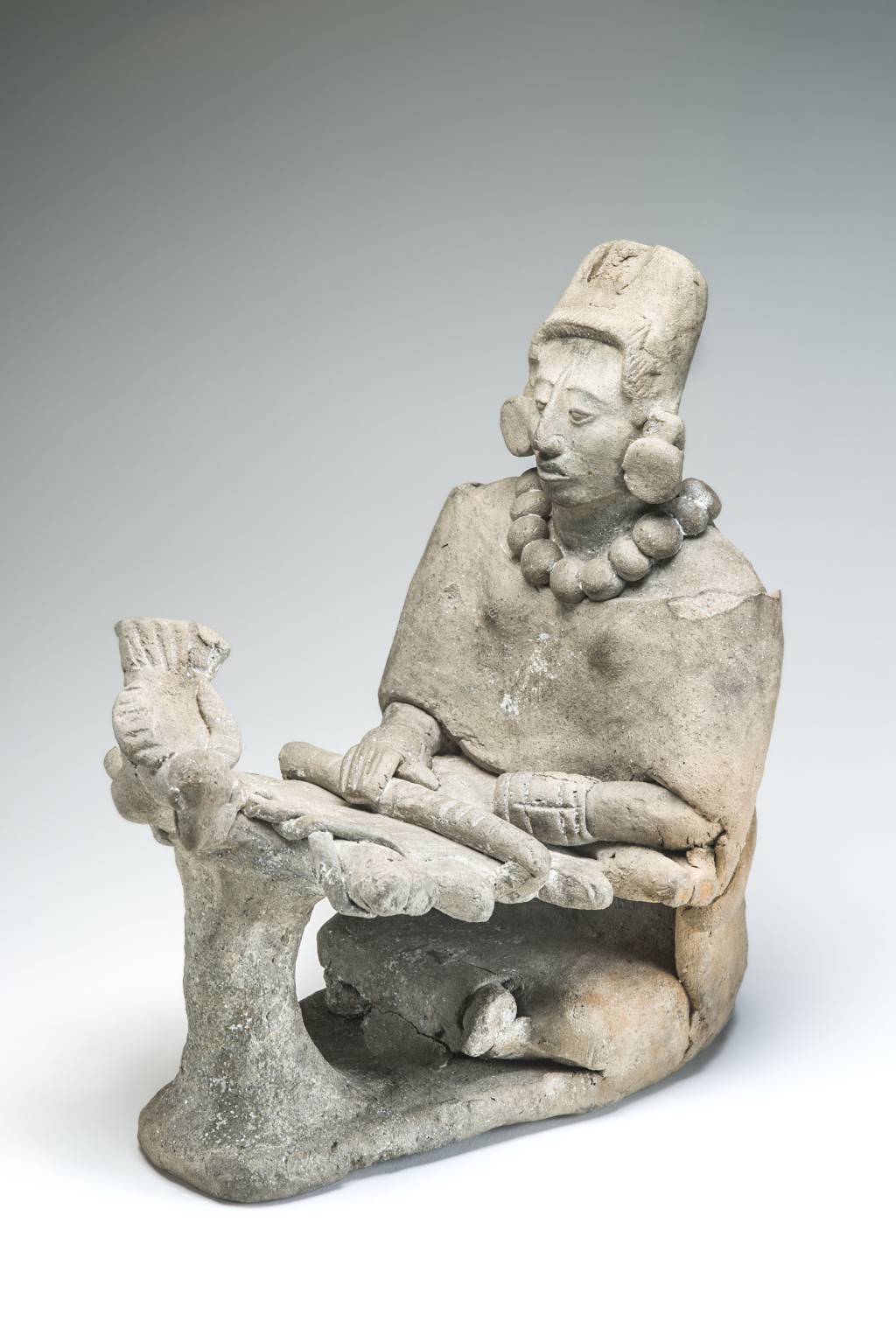 Tecelã feita de cerâmica (600-900 d. C.) Tecelã feita de cerâmica (600-900 d. C.)
