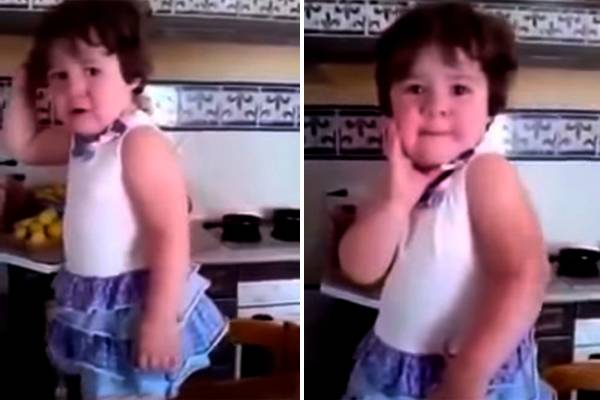 Garotinha para de chorar e faz pose ao perceber que está sendo filmada em vídeo divertido