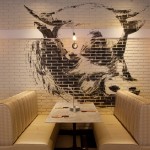 Pintura na parede: devotos da carne de boi