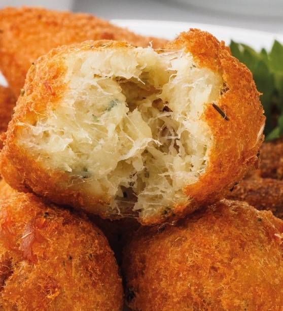 <span>Bolinho de bacalhau da&nbsp;</span><a href="https://beta-develop.vejasp.abril.com.br/estabelecimento/tasca-do-ze-da-maria/">Tasca do Z&eacute; e da Maria</a>