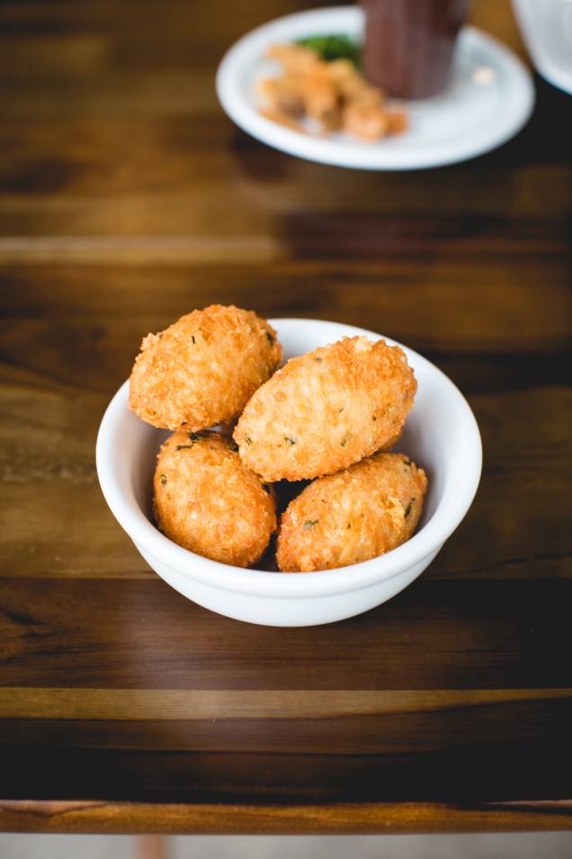 Bolinho de arroz com queijo: pedida popular Bolinho de arroz com queijo: pedida popular