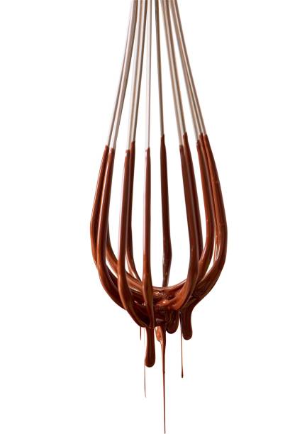 A matéria-prima,feita com cacau deprodução própria, dá forma a ótimas trufas, como a coberta de nibs A matéria-prima,feita com cacau deprodução própria, dá forma a ótimas trufas, como a coberta de nibs