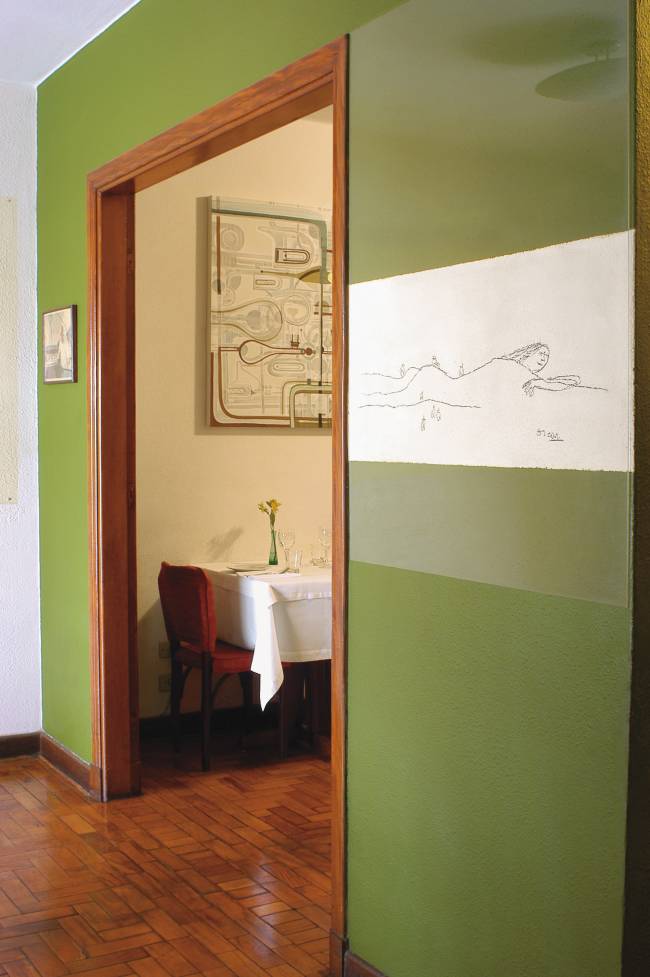 Buttina – Oscar Niemeyer Desenho de Oscar Niemeyer decorando o restaurante Buttina, feito em 1996 quando o arquiteto esteve na casa para o aniversário de um amigo, no bairro Pinheiros.