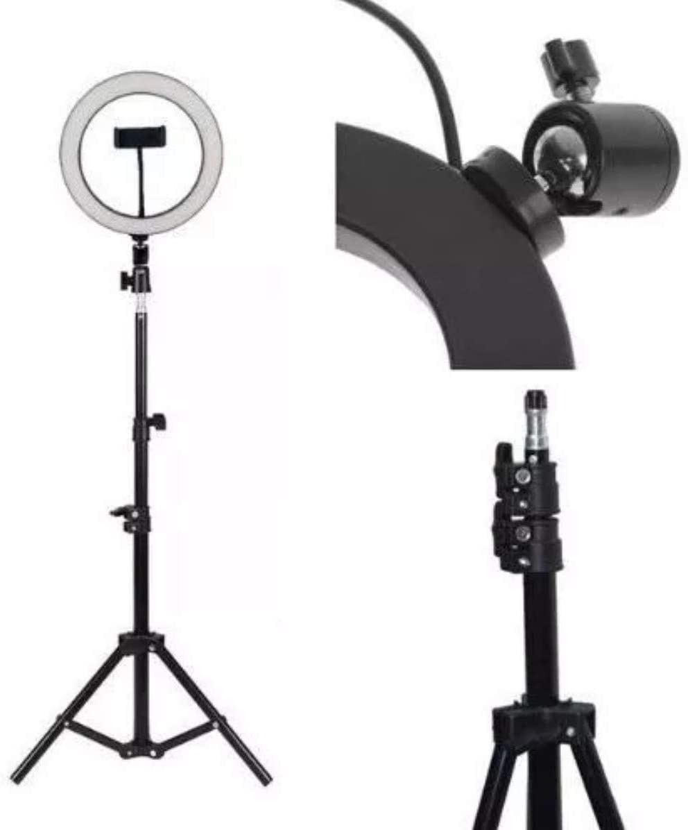 ring light Uma ring light com tripé. Há detalhes expandidos do produto em destaque