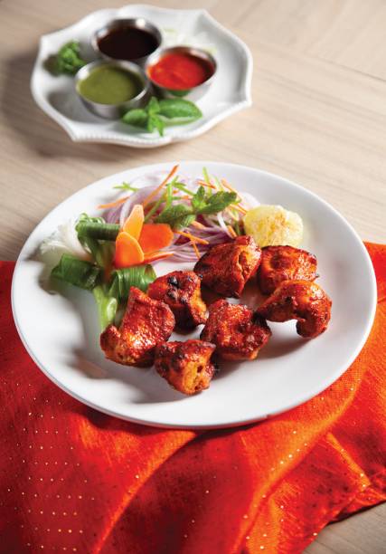 Chiken tikka: uma das opções de entrada Chiken tikka: uma das opções de entrada