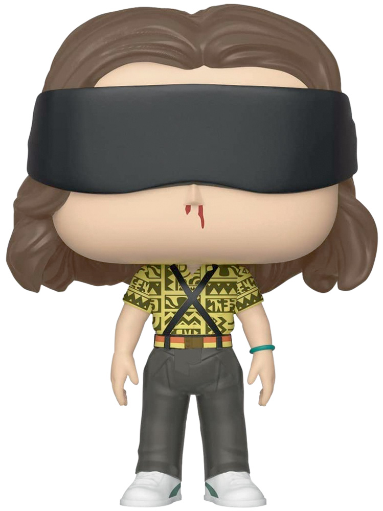 Boneco Funko Eleven.jpg Boneco Funko Pop! da Eleven. Ela tem uma faixa preta nos olhos e usa uma blusa amarela estampada e uma calça jeans
