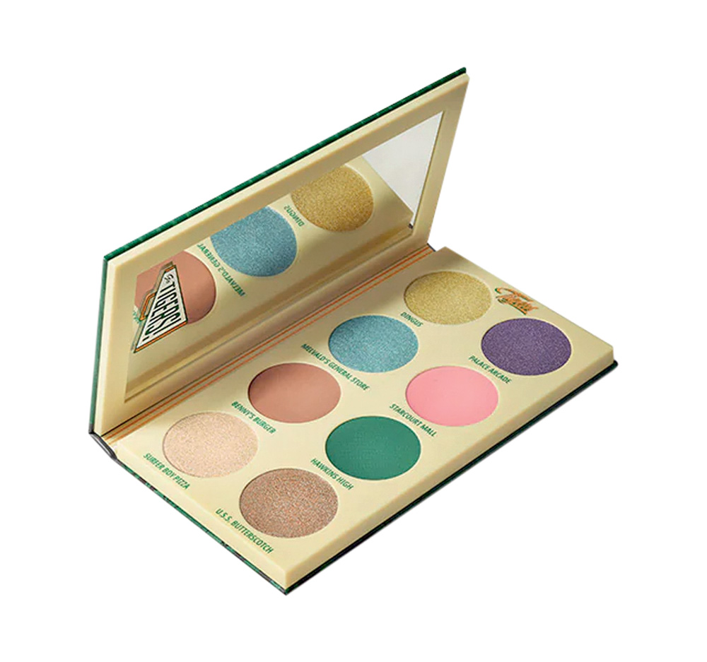 Paleta de sombras.jpg Paleta de sombras com oito tons coloridos. A paleta é bege por dentro e tem um espelho retangular, o formato da embalagem