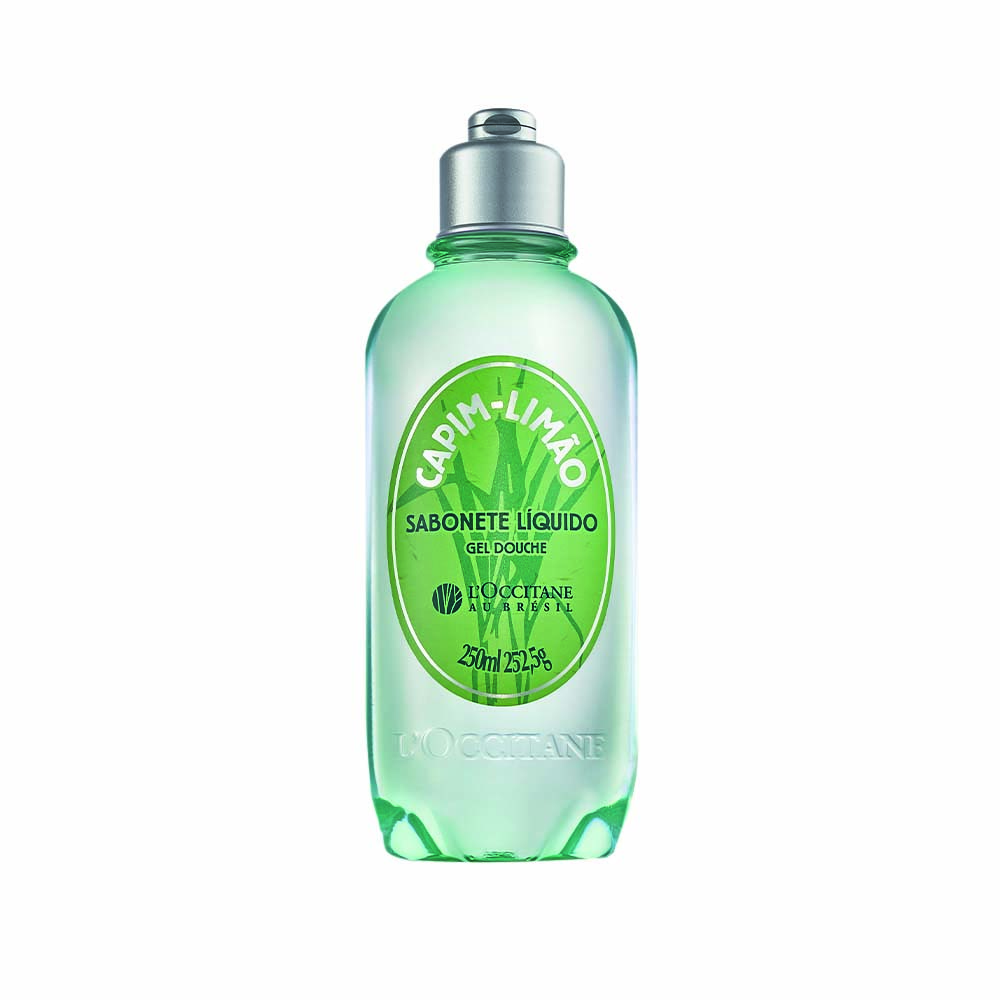 Frasco de vidro verde com sabonete l&iacute;quido transparente dentro. A tampa &eacute; prateada