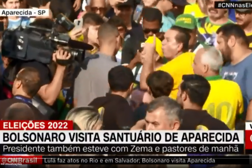 Confusão em Aparecida: bolsonaristas cercam jovem de vermelho e repórter