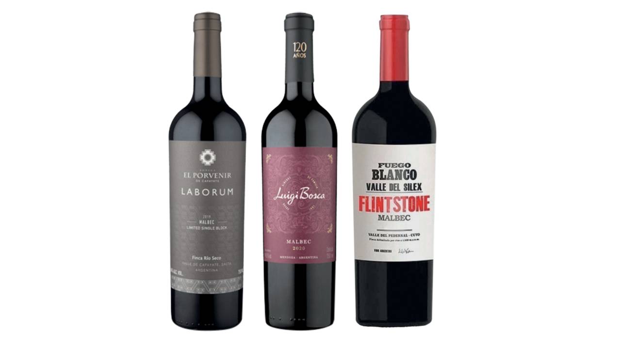 Três garrafas de vinho tinto malbec