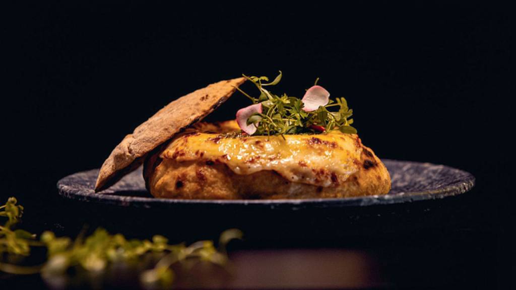 Fondue na pizza e no pão: as pedidas quentinhas do QT Pizza Bar