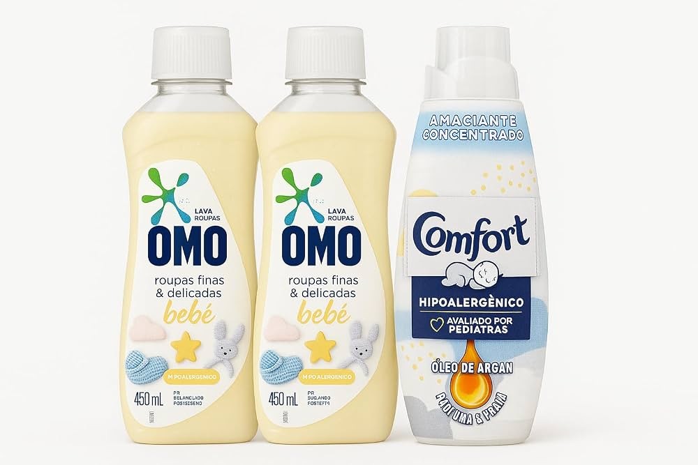 Duas garrafas de Omo Lava Roupas Bebê e uma de Amaciante Comfort Hipolaergênico, todas com rótulos em tons pastel e ilustrações infantis, sobre fundo branco